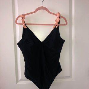 Black & pink ruffled one-piece